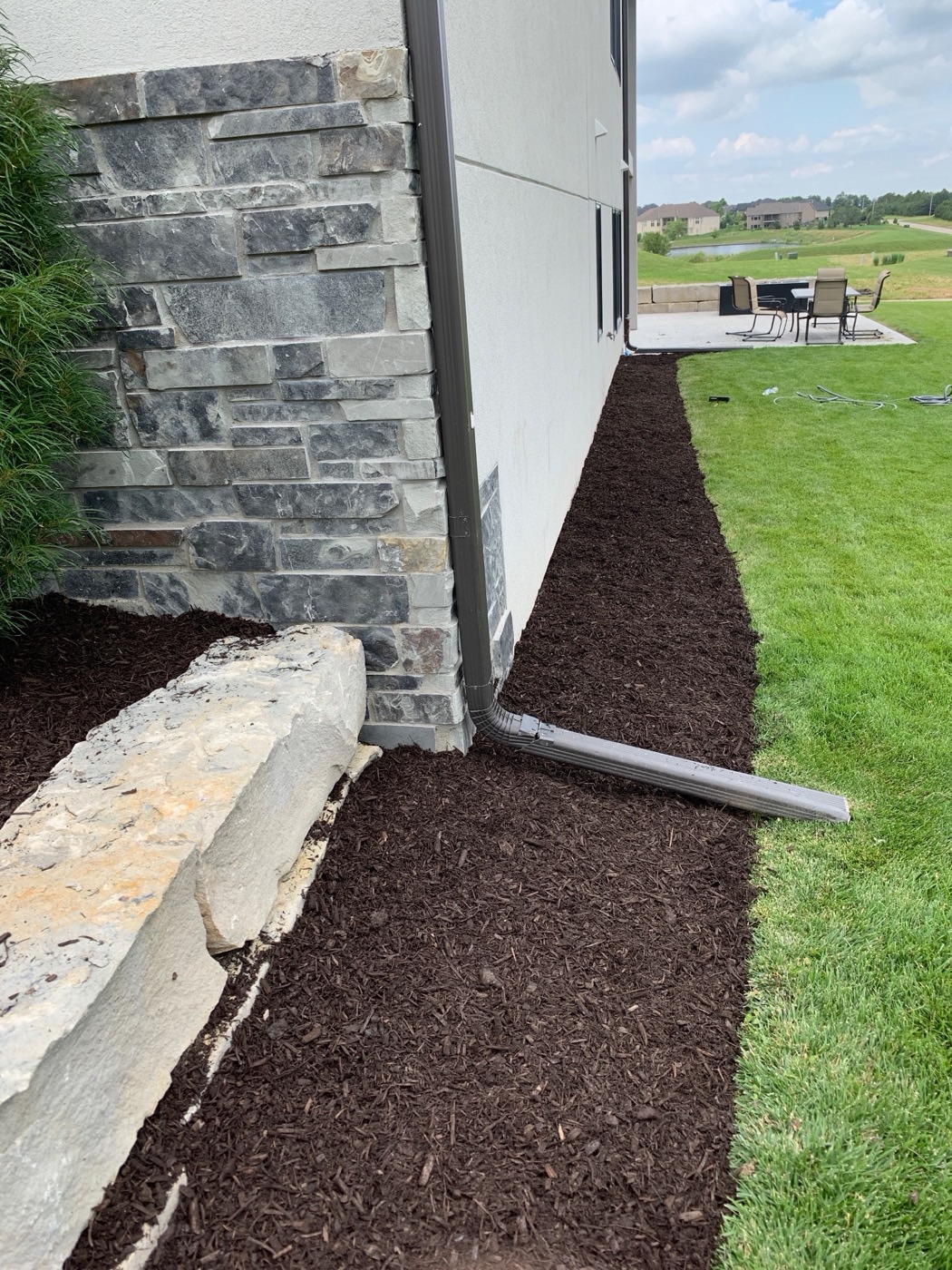 Finished mulch installation by Austin Beeman of Ohana Lawn Care at a Lincoln NE home
